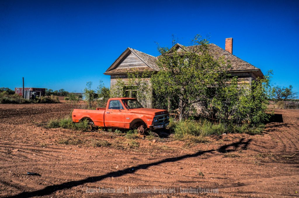 Abandoned Farm House and GMC Truck sitting on Blocks in